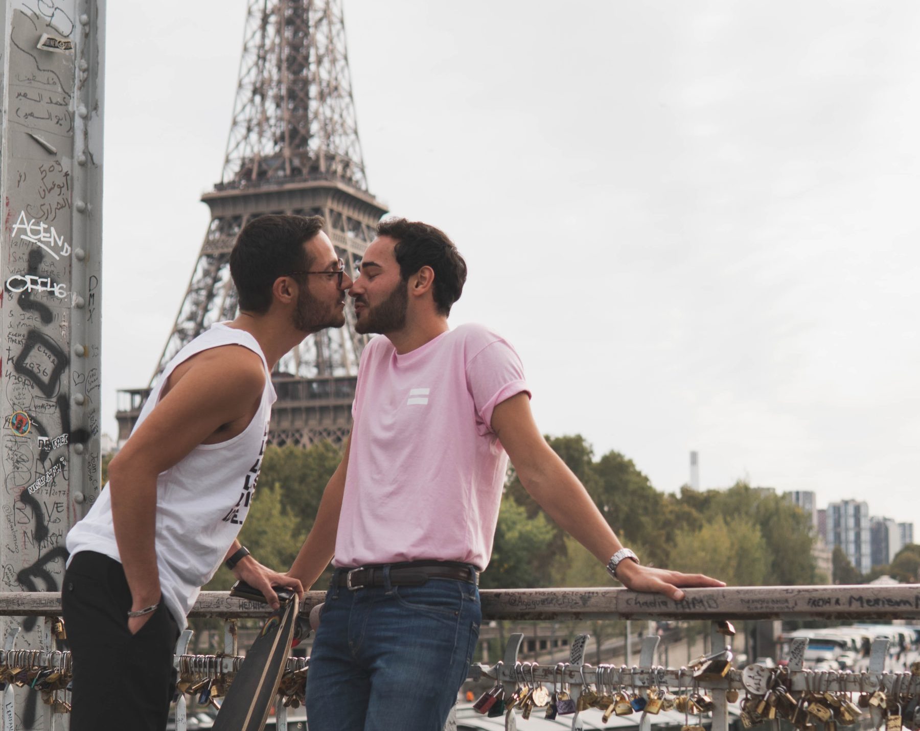 Two Men Standing Beside Rail Two Men Standing Beside Rail