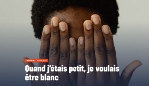 Miniature de l'article "Quand j’étais petit, je voulais être blanc". Portrait d'une jeune personne noire. L'intégralité de son visage est cachée par ses deux mains qu'elle tient devant elle.